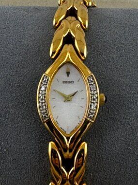 Vintage Ladies Seiko 4 Diamond Illusion Setting Gold Tone Quartz Dress Watch